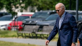 U.S. President Joe Biden walks on the Ellipse to board Marine One on May 22, 2021 in Washington, DC.