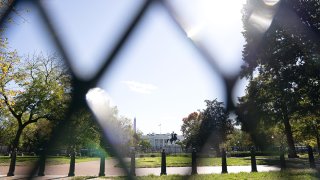 FILE - Fencing surrounds Lafayette Square in front of the White House in Washington, D.C., Nov. 2, 2020.