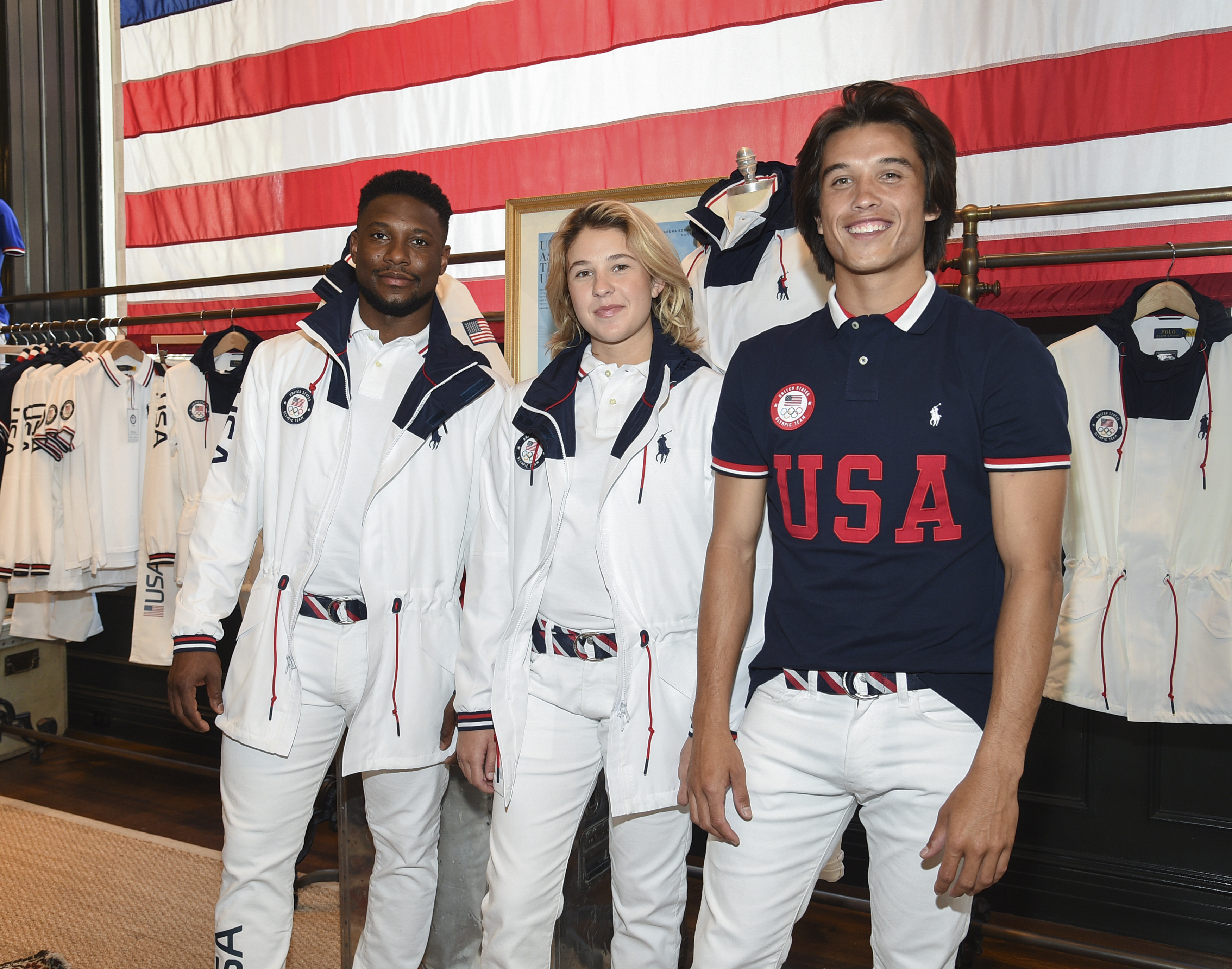 Athletes Daryl Homer (Fencing), from left, Jordyn Barratt (Skateboard) and Heimana Reynolds (Skateboard) participate in the Team USA Tokyo Olympic closing ceremony uniform unveiling at the Ralph Lauren SoHo Store on April 13, 2021, in New York City.