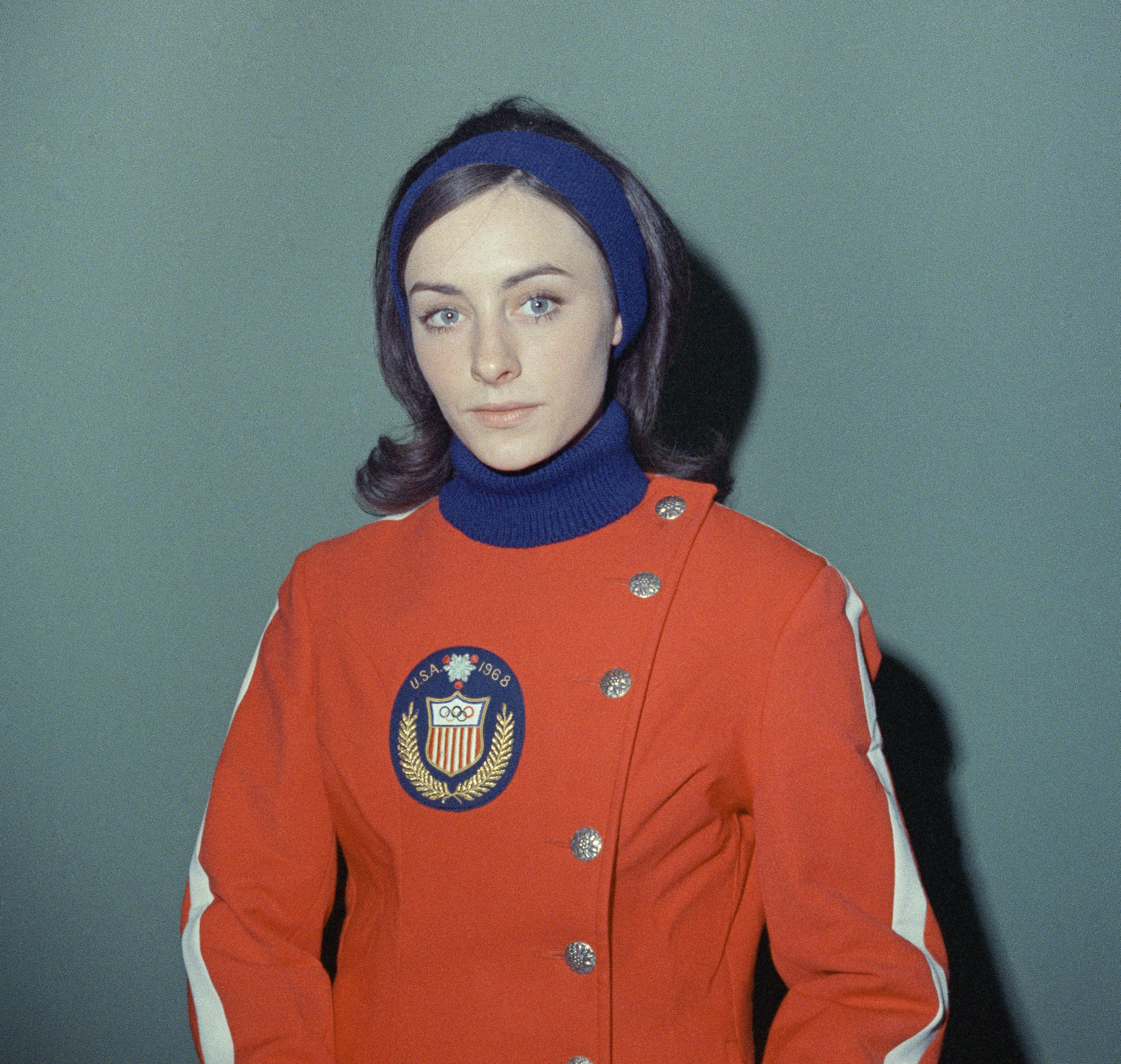 National champion and Olympic team figure skating member Peggy Fleming of Boulder Springs, Colorado, wears her Olympic parade uniform during a fitting session on Jan. 22, 1968.