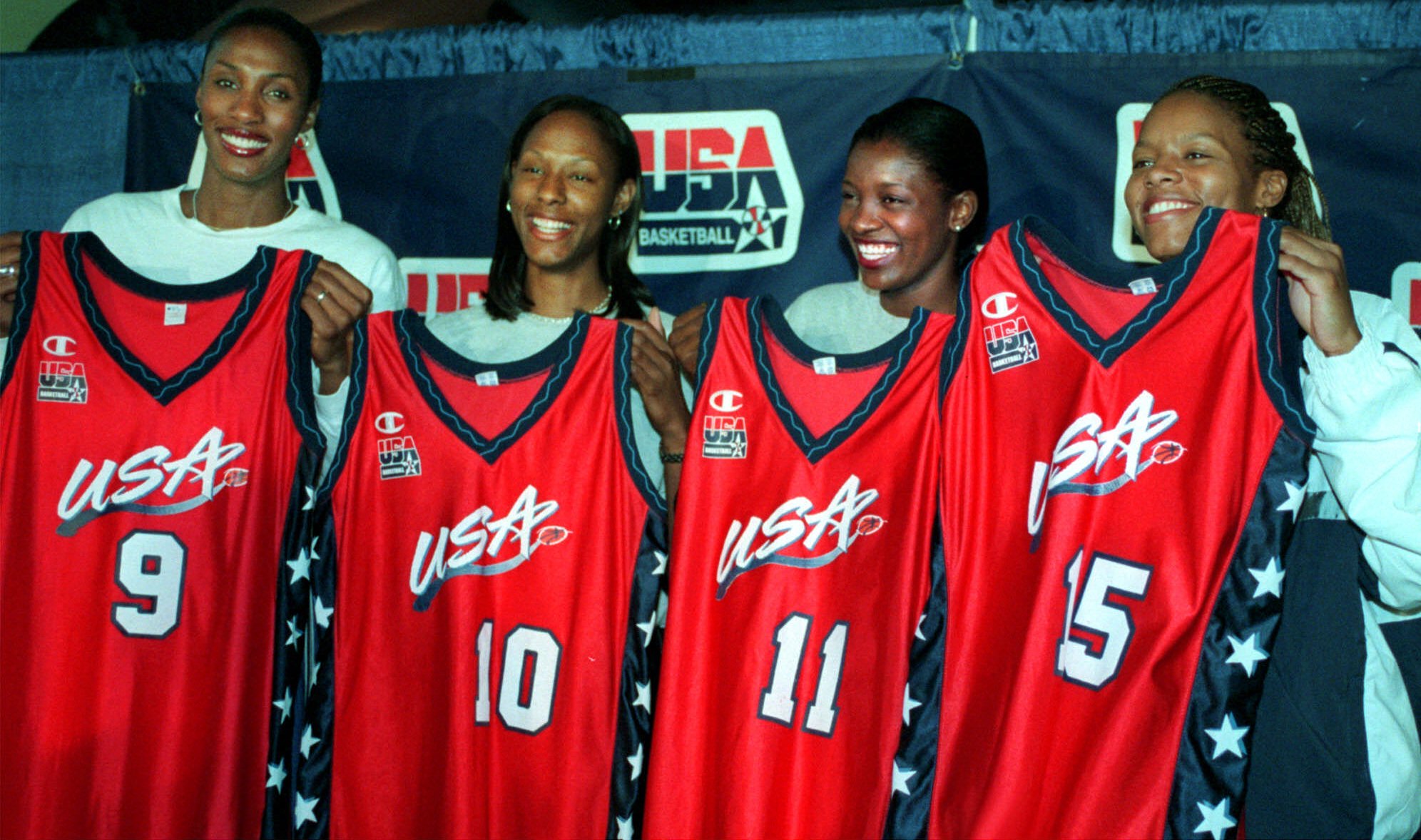 New members of the U.S. Women’s National Basketball, from left, Lisa Leslie, Chamique Holdsclaw, DeLisha Milton and Nikki McCray pose with their uniforms during a news conference at the MCI Center during the 2000 Olympics.