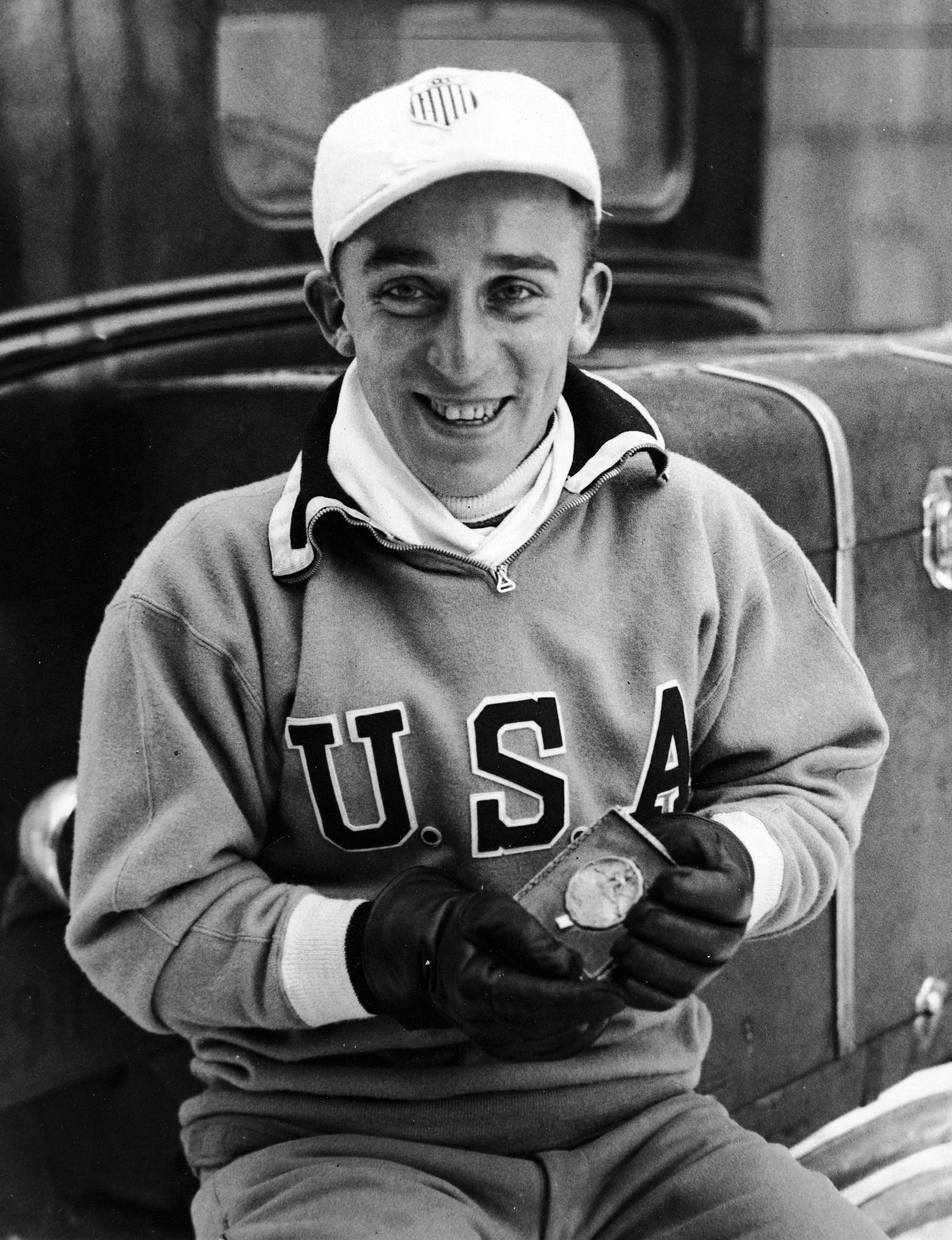 American speed skater Irving Jaffee holds his gold medal after winning the men’s 10,000-meter speed skating event at the 1932 Winter Olympic Games, Lake Placid, New York, on Feb. 9, 1932.