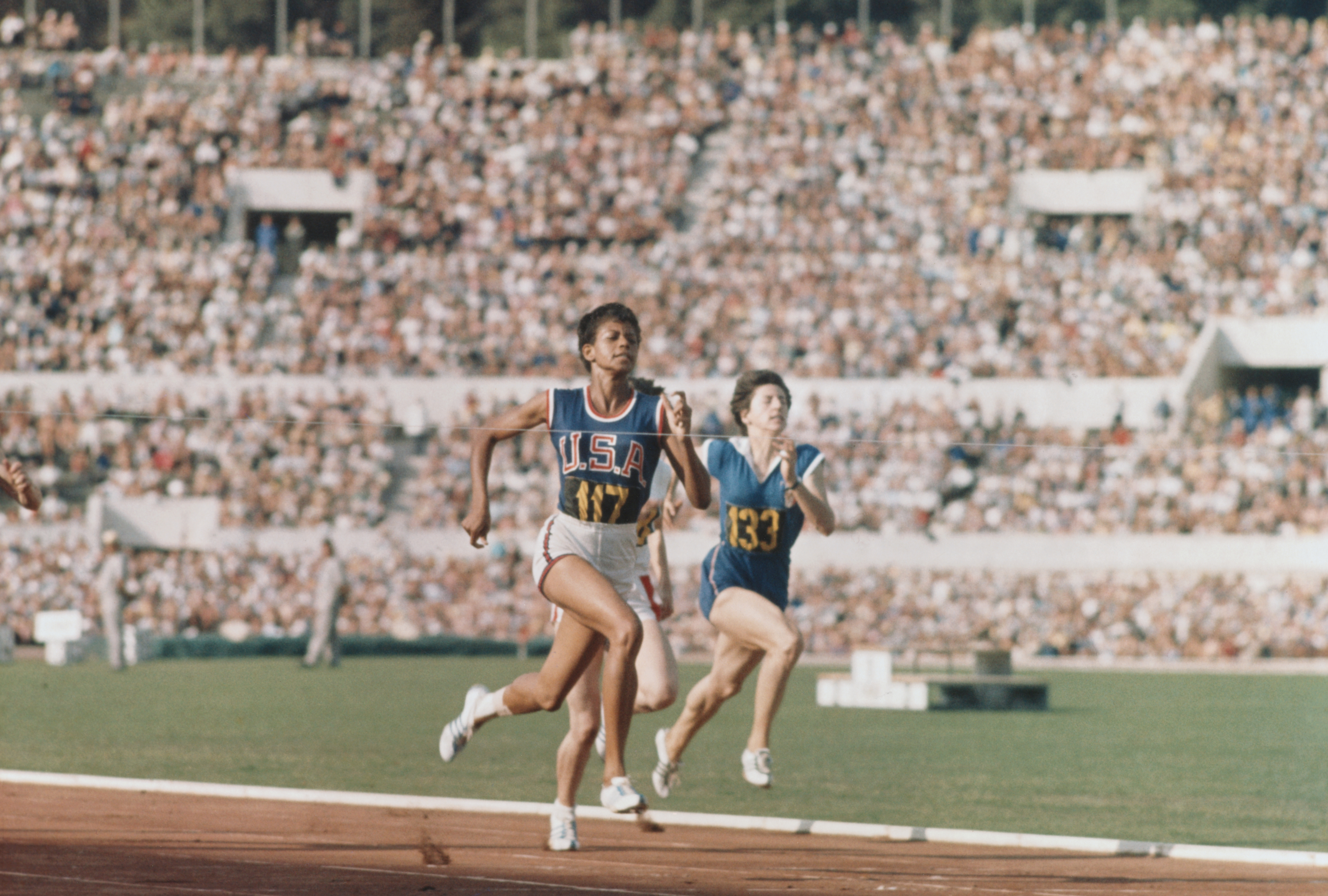American Olympic sprinter Wilma Rudolph in the final steps of a race at the 1960 Summer Games. Rudolph, who couldn’t walk without the use of braces until she was nine, won gold in the 100- and 200-meter run, and anchored the winning 400-meter relay team.