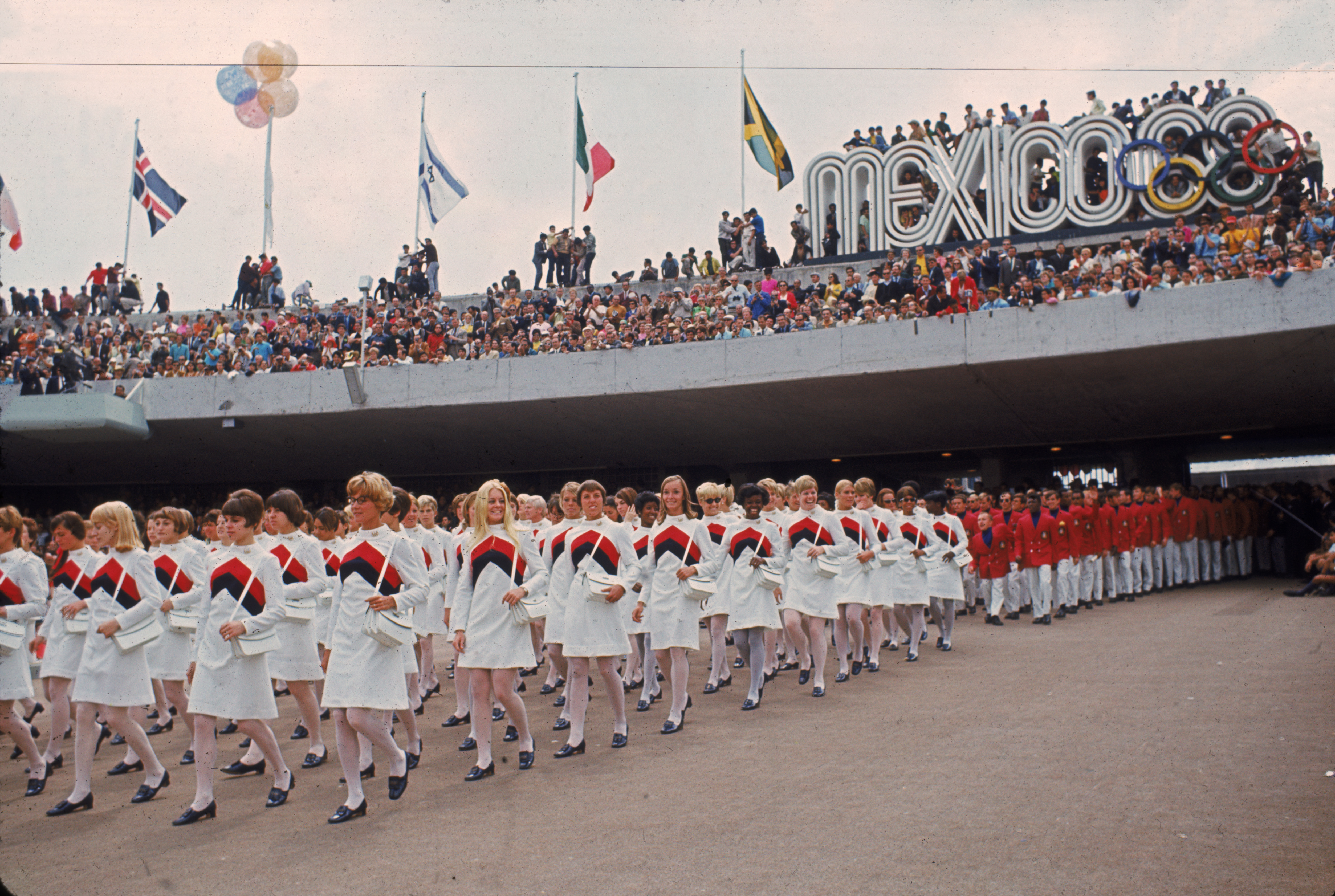 The women of the United States Olympic team lead their male counterparts into the University City Olympic Stadium during the opening ceremonies of the Olympic Games in Mexico City on Oct. 12, 1968.