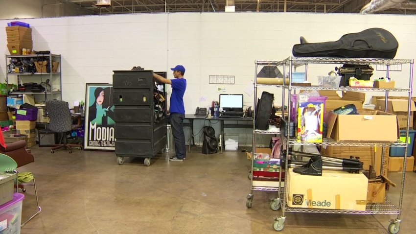 Alex Juarez, a Goodwill North Central Texas e-commerce processer, was sorting through bins of items from across the area when he came across "Air Raid," an old Atari game.