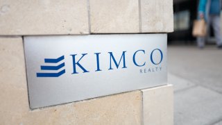 Close-up of sign for Kimco Realty, a real estate investment trust which is among the largest publicly-traded operators of open-air shopping malls, in the San Francisco Bay Area town of Daly City, California, November 3, 2017.