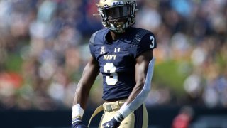 Navy Midshipmen cornerback Cameron Kinley celebrates during an NCAA Football match at Navy-Marine Corps Memorial Stadium in Annapolis, MD.