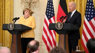 US President Joe Biden and German Chancellor Angela Merkel hold a joint press conference in the East Room of the White House in Washington, DC, July 15, 2021.
