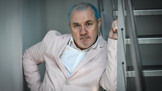 British artist Damien Hirst poses during the press visit of an exhibition entitled ‘Cherry Blossoms’ dedicated to his work, on July 2, 2021 at the Fondation Cartier in Paris.