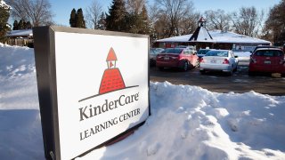 A sign sits in front of the KinderCare Learning Center on February 5, 2015 in Palatine, Illinois.