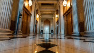 This June 30, 2021, photo shows the halls of the Capitol outside the Senate in Washington