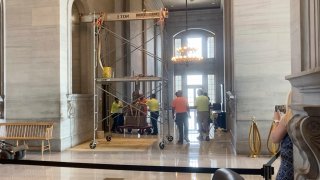 The Nathan Bedford Forrest bust is removed from inside of the Tennessee Capitol