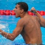 Ahmed Hafnaoui, of Tunisia, celebrates after winning the final of the men's 400-meter freestyle at the 2020 Olympics on July 25, 2021, in Tokyo, Japan.