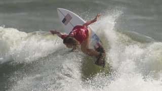 Caroline Marks, of the United States, maneuvers on a wave during third round of women's surfing competition at the 2020 Olympics on July 26, 2021, at Tsurigasaki beach in Ichinomiya, Japan.