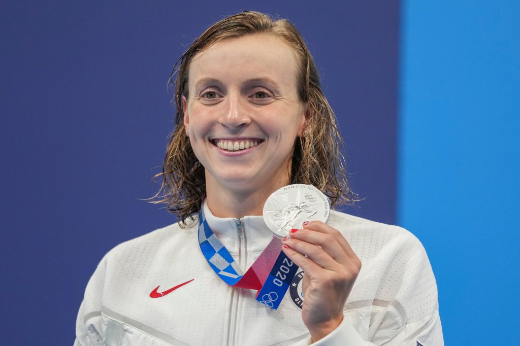 Katie Ledecky, of the United States poses with her silver medal in the women's 400-meters freestyle at the 2020 Olympics on July 26, 2021, in Tokyo, Japan.