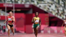 Shelly-Ann Fraser-Pryce, of Jamaica, wins a heat in the women's 100-meter run