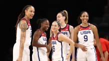 Brittney Griner #15 of the USA Basketball Women's National Team and teammates Jewell Loyd #4, Sue Bird #6, Breanna Stewart #10 and A'ja Wilson #9 during the game against the Nigeria Women's National Team on July 18, 2021 at Michelob ULTRA Arena in Las Vegas, Nevada.