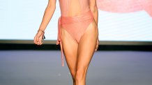 MIAMI BEACH, FLORIDA - JULY 08: A model walks the runway for DESTINATION Colombia Runway Presenting PQ Swim, Palmacea, Naranja Furcado, Ancora, Smeralda, Mola Mola Paraiso Miami Beach at The Paraiso Tent on July 08, 2021 in Miami Beach, Florida. (Photo by Frazer Harrison/Getty Images for Paraiso Miami Beach)