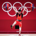 Li Fabin of Team China competes in the Men's 61kg Weightlifting Group A match on day two the Tokyo 2020 Olympic Games at the Tokyo International Forum on July 25, 2021 in Tokyo, Japan. Li set an Olympic record, lifting 313kg for the event.