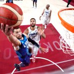 Zach LaVine #5 of Team United States drives past Rudy Gobert #27 of Team France for a layup during the second half of the Men's Preliminary Round Group B game on day two of the Tokyo 2020 Olympic Games at Saitama Super Arena on July 25, 2021 in Saitama, Japan.