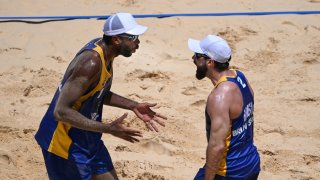 Bruno Schmidt's bid for consecutive beach volleyball golds started with a win