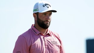 Jul 18, 2021; Sandwich, England, GBR; Jon Rahm looks down the fairway for his shot from the ninth tee during the final round of the Open Championship golf tournament.