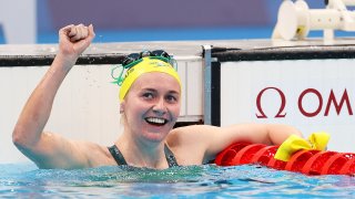 Ariarne Titmus of Australia celebrates victory in the women's 400m freestyle over Katie Ledecky.
