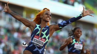 In this June 19, 2021, file photo, Sha’Carri Richardson, left, celebrates her win in the finals of the women’s 100 meter dash at the U.S. Olympic Track & Field Trials at Hayward Field in Eugene.