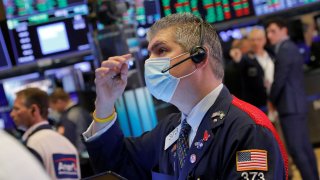 A trader works on the trading floor at the New York Stock Exchange (NYSE) in Manhattan, New York City, U.S., August 10, 2021.