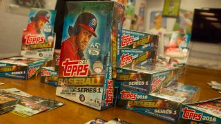 Topps’ baseball cards from the 2016 season are on display during the “Open Topps Baseball Series 1 Cards ” event at the Topps’ offices on February 10, 2016 in New York City.