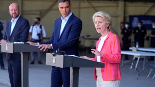 EU Commission president Ursula von der Leyen, right, speaks alongside EU Council President Charles Michel, left, and Spain's Prime Minister Pedro Sanchez