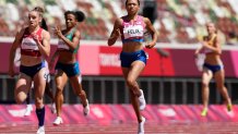Allyson Felix, of United States races ahead of Lada Vondrova, of Czech Republic in a women's 400-meter heat at the 2020 Summer Olympics, Tuesday, Aug. 3, 2021, in Tokyo, Japan.