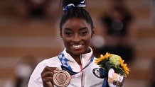 USA's Simone Biles poses with her bronze medal