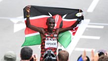 Kenya's Eliud Kipchoge celebrates after winning the Men's Marathon Final during the Tokyo 2020 Olympic Games in Sapporo on Aug. 8, 2021.