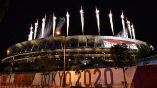 Fireworks go off around the Olympic Stadium during the closing ceremony of the Tokyo 2020 Olympic Games, as seen from outside the venue in Tokyo on Aug. 8, 2021.