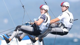 FUJISAWA, JAPAN – AUGUST 01: Riley Gibbs and Anna Weis of Team United States of Team Germany compete in the Nacra 17 Foiling class on day nine of the Tokyo 2020 Olympic Games at Enoshima Yacht Harbour on August 01, 2021 in Fujisawa, Kanagawa, Japan.