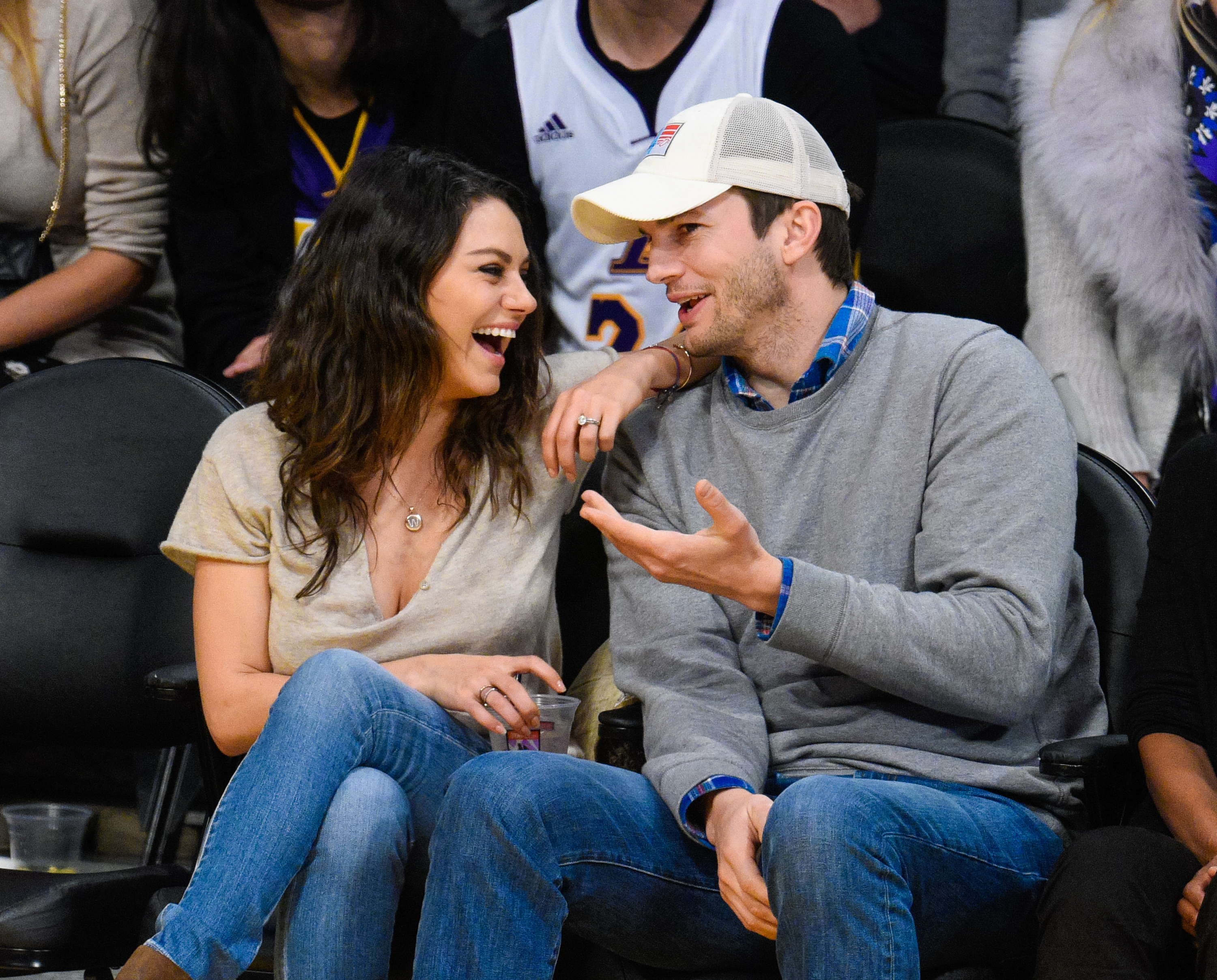 Watch Ashton Kutcher Hilariously Catch Mila Kunis in the Act of ‘Breaking’ Their Dry January Vow