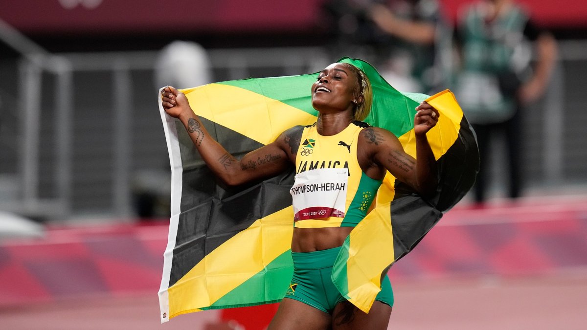 Ямайский бегун рекордсмен. Элейн Томпсон Ямайка. Бегунья из Ямайки Томсон. Легкоатлетка из Ямайки. Олимпийские игры Ямайка.