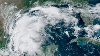 This satellite image provided by NOAA shows Tropical Storm Nicholas in the Gulf of Mexico on Sunday, Sept. 12, 2021