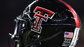 A Texas Tech helmet awaits the next series during the football game between the Texas Tech Red Raiders and University of Houston Cougars at NRG Stadium on September 4, 2021 in Houston, Texas.