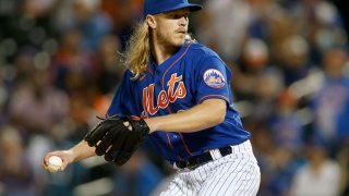 NEW YORK, NEW YORK – SEPTEMBER 28: Noah Syndergaard #34 of the New York Mets pitches during the first inning in game 2 of a double header against the Miami Marlins at Citi Field on September 28, 2021 in New York City. The Mets defeated the Marlins 2-1 in nine innings. (Photo by Jim McIsaac/Getty Images)