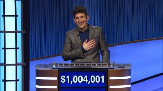 This photo provided by Jeopardy Productions Inc. shows “Jeopardy!” contestant Matt Amodio after his total win amount was announced, Sept. 24, 2021. Amodio, a fifth-year computer science Ph.D student at Yale University, won $48,800 for his 28th victory, bringing his total winnings to $1,004,001.