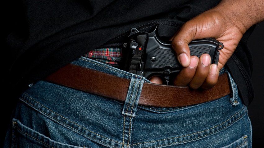 Black man with concealed weapon