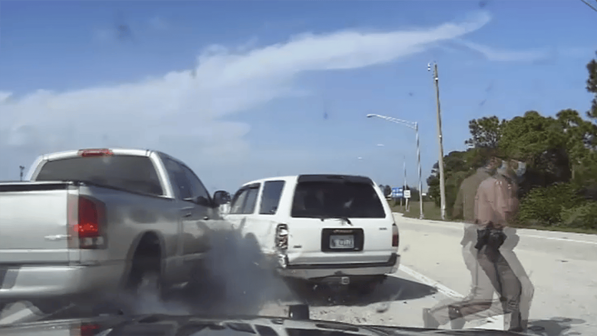 Video Shows Florida Trooper, Woman Narrowly Avoid Truck on Side of I-95 ...