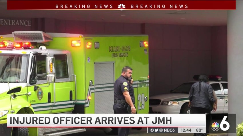 Injured Officer Arrives at Jackson Memorial Hospital