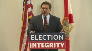 Florida Gov. Ron DeSantis speaks at a news conference in West Palm Beach on Nov. 3, 2021.
