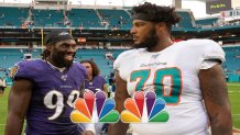 MIAMI GARDENS, FL - SEPTEMBER 08: Baltimore Ravens linebacker Matt Judon (99) smiles as he talks with Miami Dolphins tackle Julie'n Davenport (70) on the field after the NFL game between the Baltimore Ravens and the Miami Dolphins at the Hard Rock Stadium in Miami Gardens, Florida on September 8, 2019. (Photo by Doug Murray/Icon Sportswire via Getty Images)
