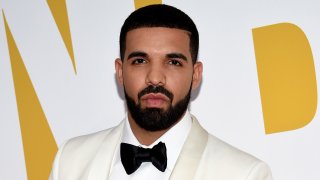 FILE - In this June 26, 2017, file photo, Canadian rapper Drake arrives at the NBA Awards in New York. Drake is going on tour. He announced the Aubrey and The Three Amigos tour on Monday, May 14, 2018. Drake will be joined by “Walk It Talk It” collaborators Migos and special guests on the North American leg through the summer and fall.