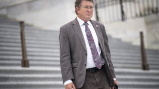 Rep. Thomas Massie, R-Ky., walks down the House steps