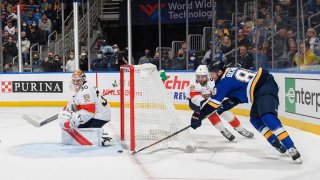 ST. LOUIS, MO – DECEMBER 7: Pavel Buchnevich #89 of the St. Louis Blues scores the game-winning goal as Spencer Knight #30 and Sam Bennett #9 of the Florida Panthers attempt to defend at the Enterprise Center on December 7, 2021 in St. Louis, Missouri. (Photo by Scott Rovak/NHLI via Getty Images)